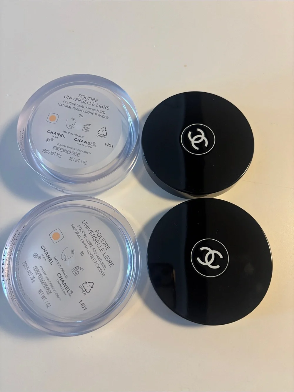 Chanel powder jars and puffs
